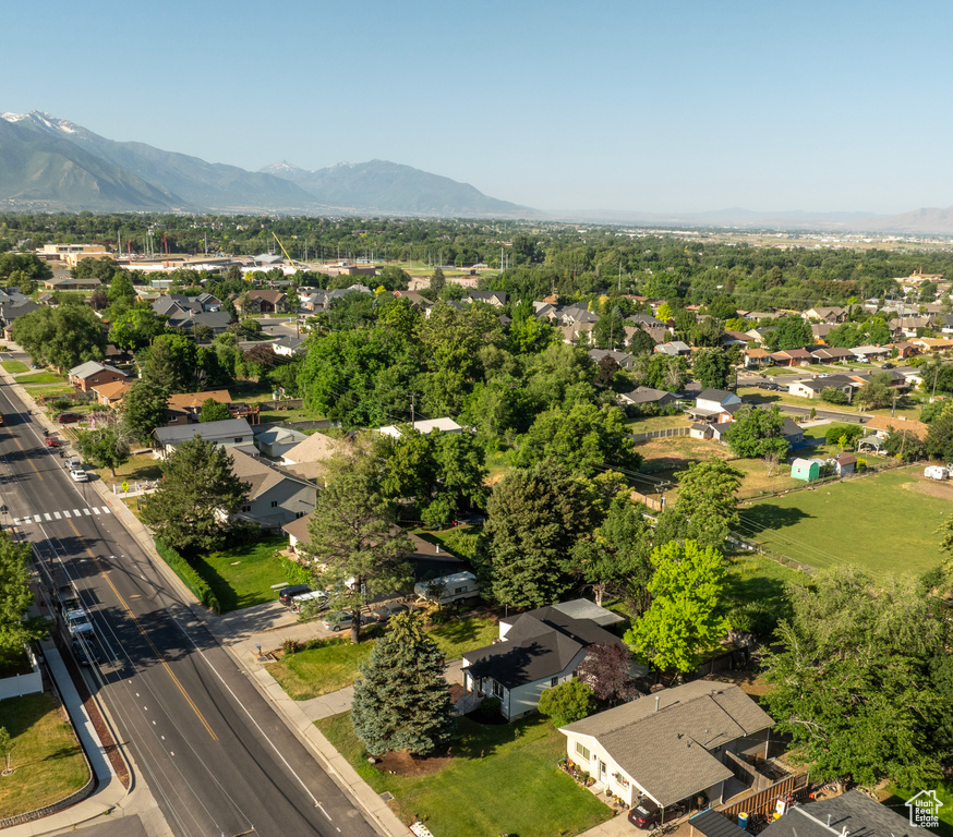 Aerial view of residential area with a mountain backdrop