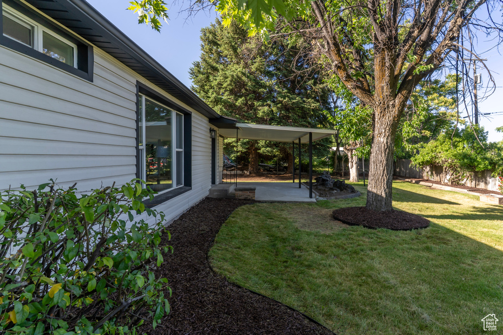 View of yard with a patio area