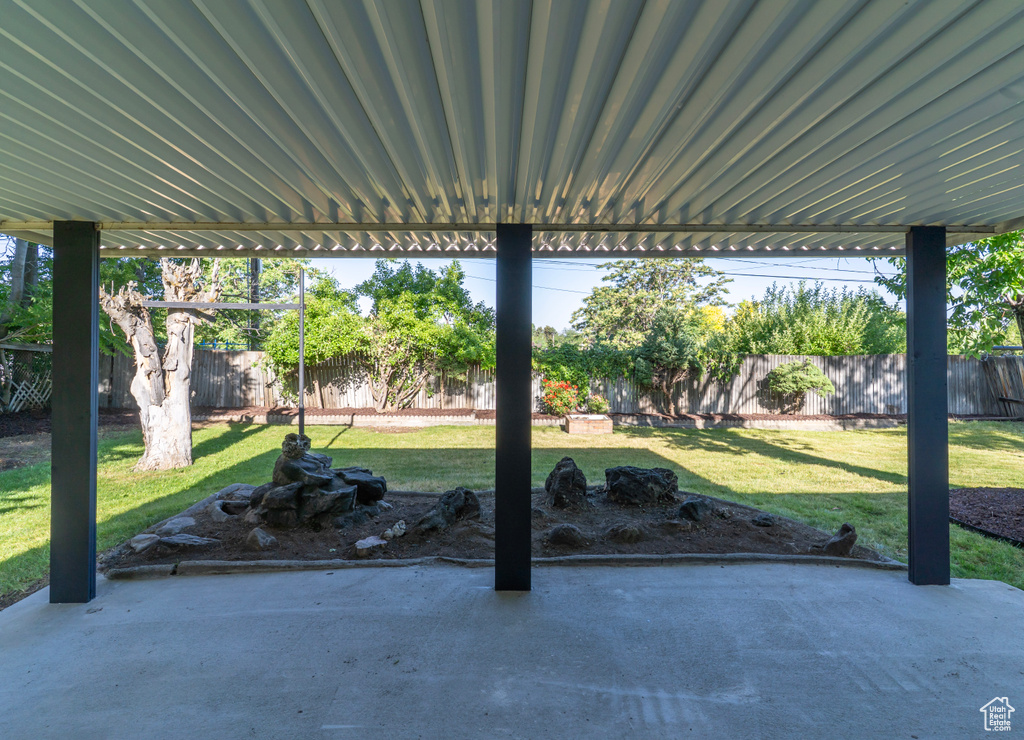 Fenced backyard featuring a patio area