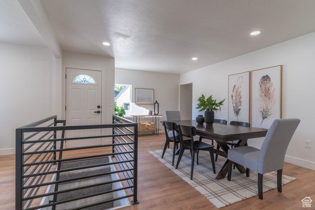 Dining room featuring recessed lighting and wood finished floors