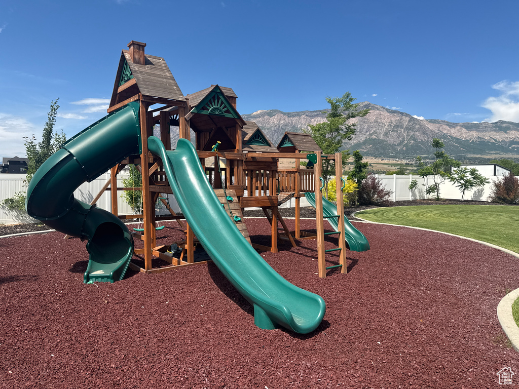 Community playground with a mountain view