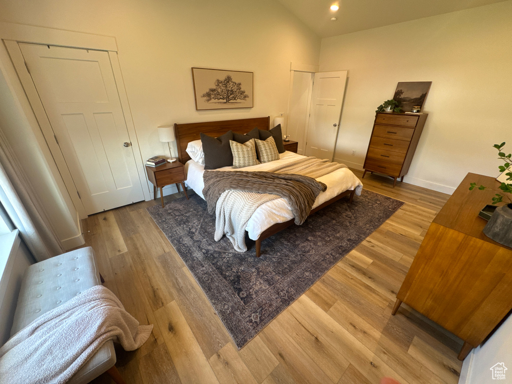 Bedroom featuring light wood finished floors and recessed lighting