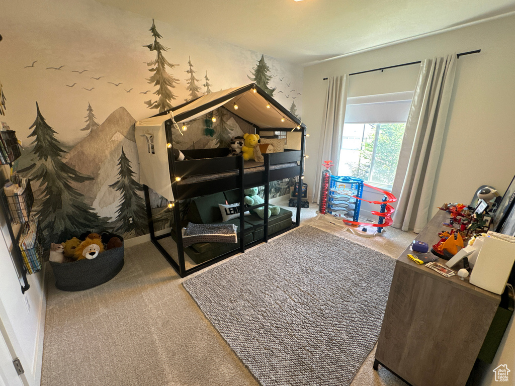 Sitting room featuring carpet flooring