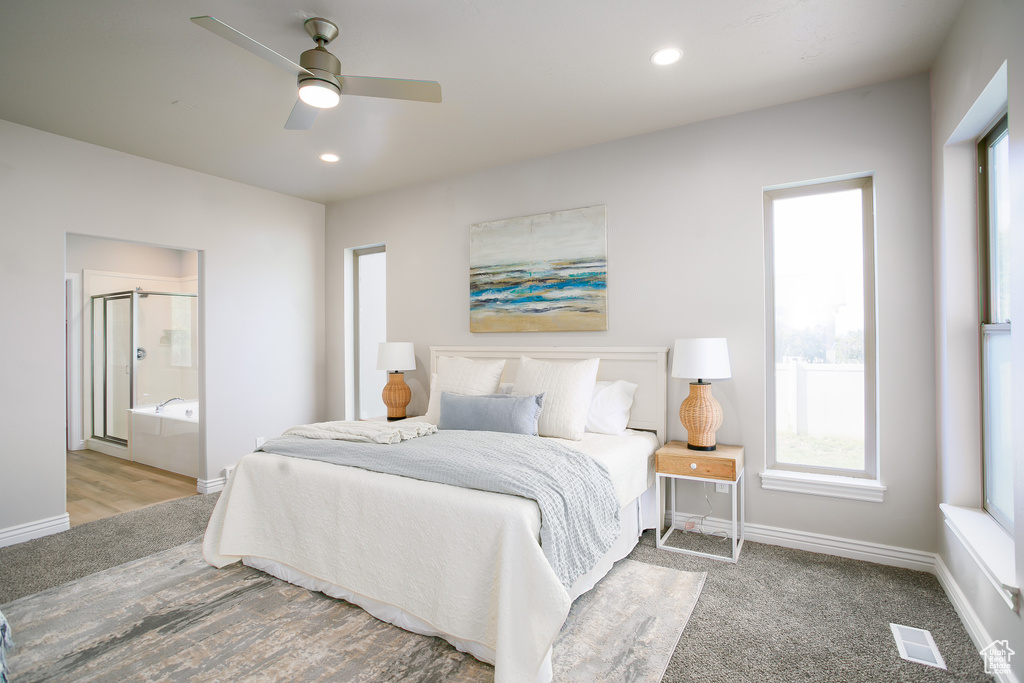 Bedroom with recessed lighting, connected bathroom, and ceiling fan