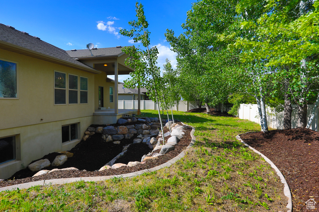 View of fenced backyard
