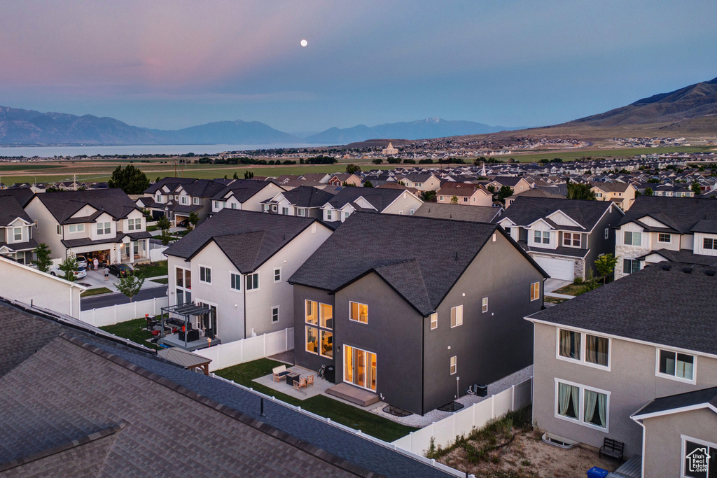 View of mountain background featuring nearby suburban area