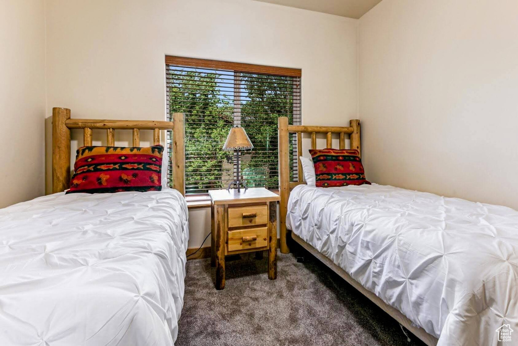 Bedroom featuring carpet flooring