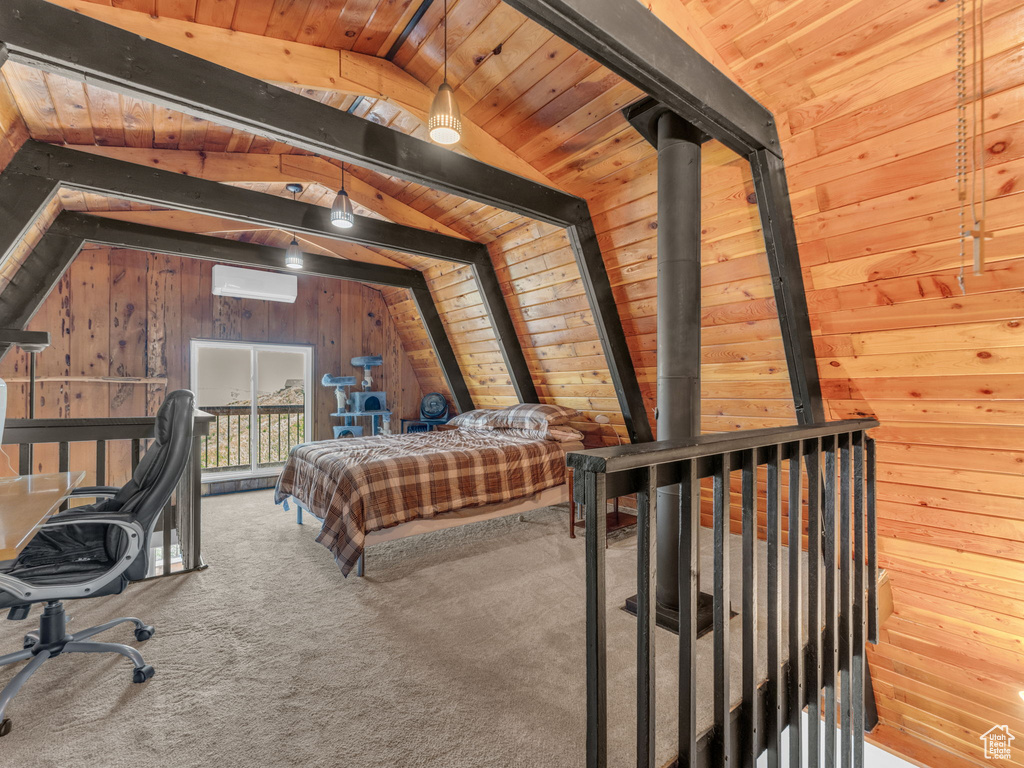 Carpeted bedroom with wood walls, vaulted ceiling, and wooden ceiling