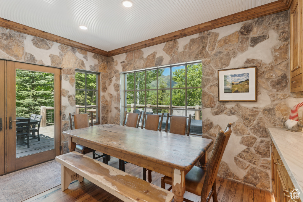Dining space featuring light wood-style floors and recessed lighting