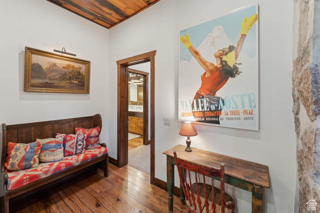 Living area with wood-type flooring and baseboards