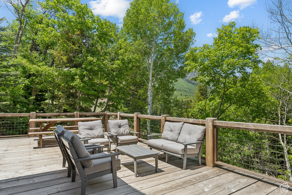 Deck featuring outdoor lounge area