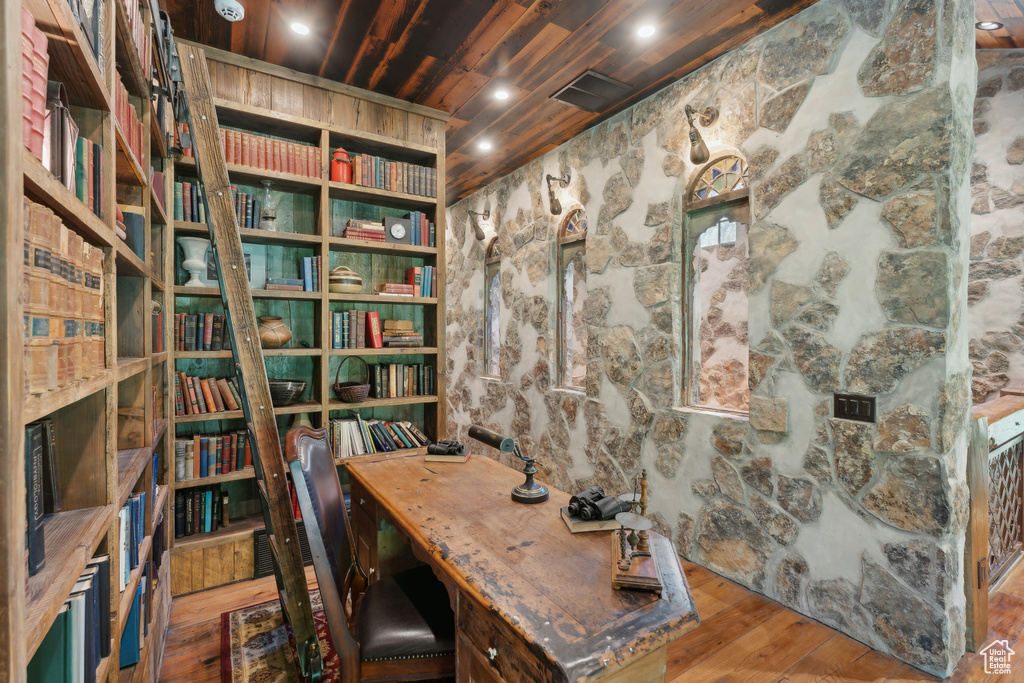 Home office featuring wood ceiling and hardwood / wood-style floors