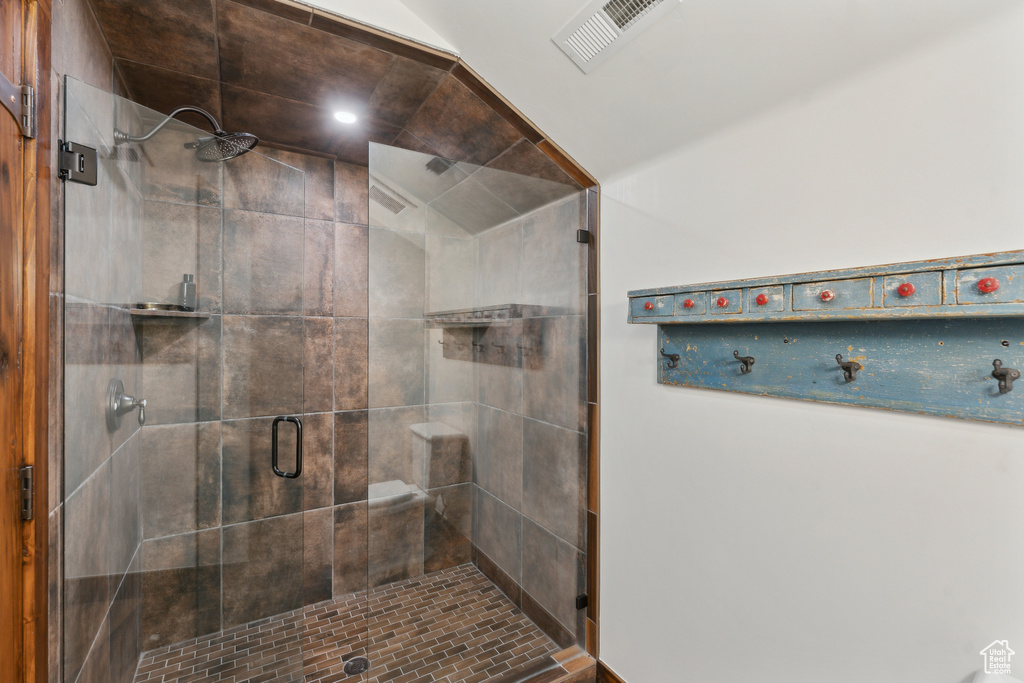 Full bathroom featuring a stall shower and recessed lighting