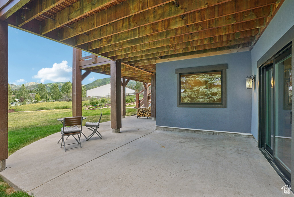 View of patio featuring a mountain view