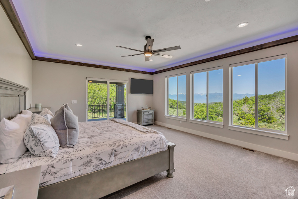 Bedroom featuring access to outside, carpet flooring, recessed lighting, and ceiling fan