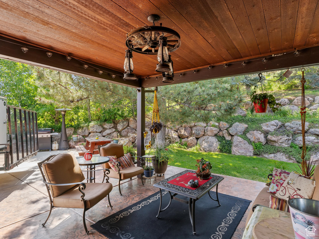 View of patio / terrace featuring a ceiling fan