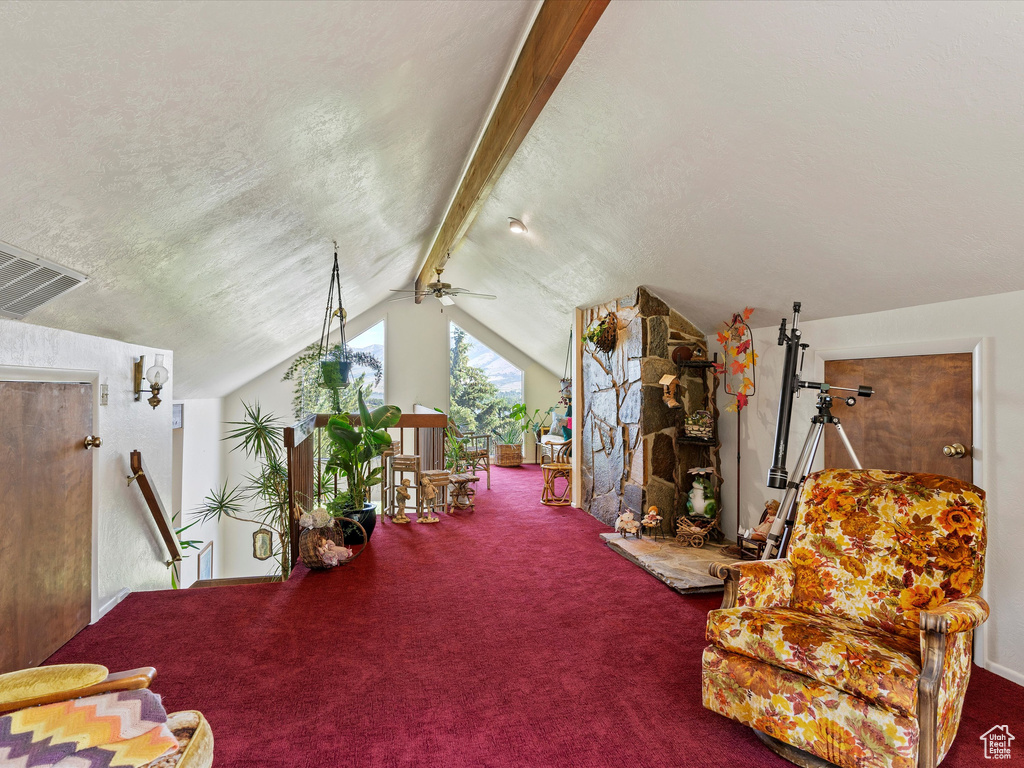 Sitting room with carpet floors and an upstairs landing