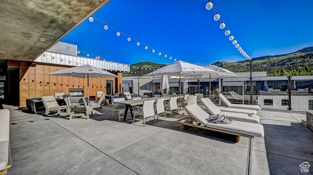 View of patio with a mountain view