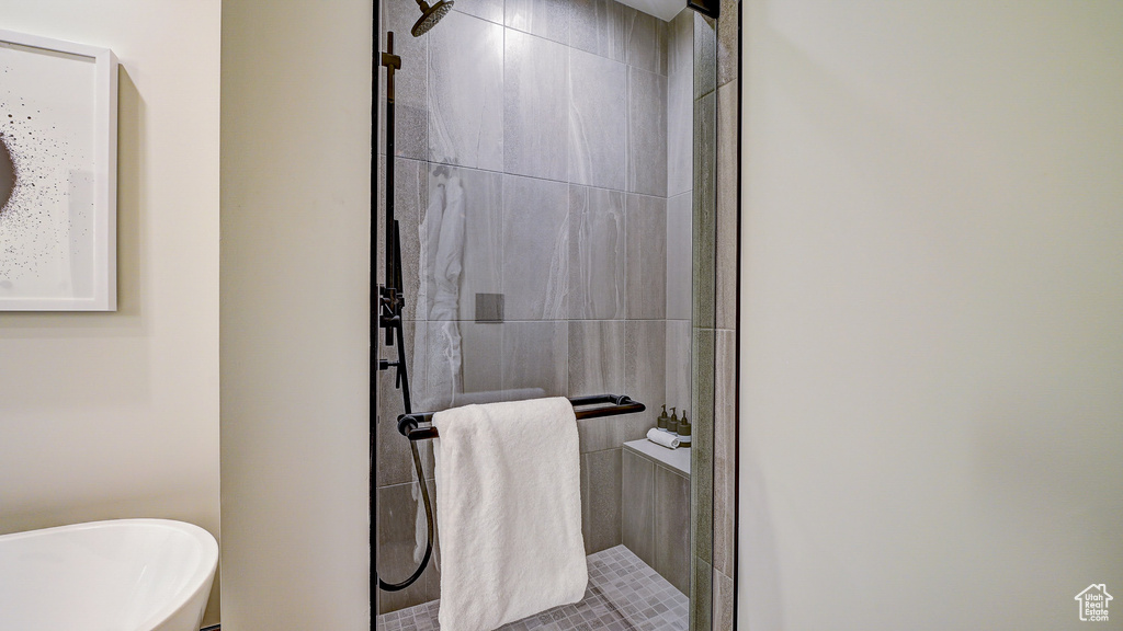 Bathroom featuring a shower stall