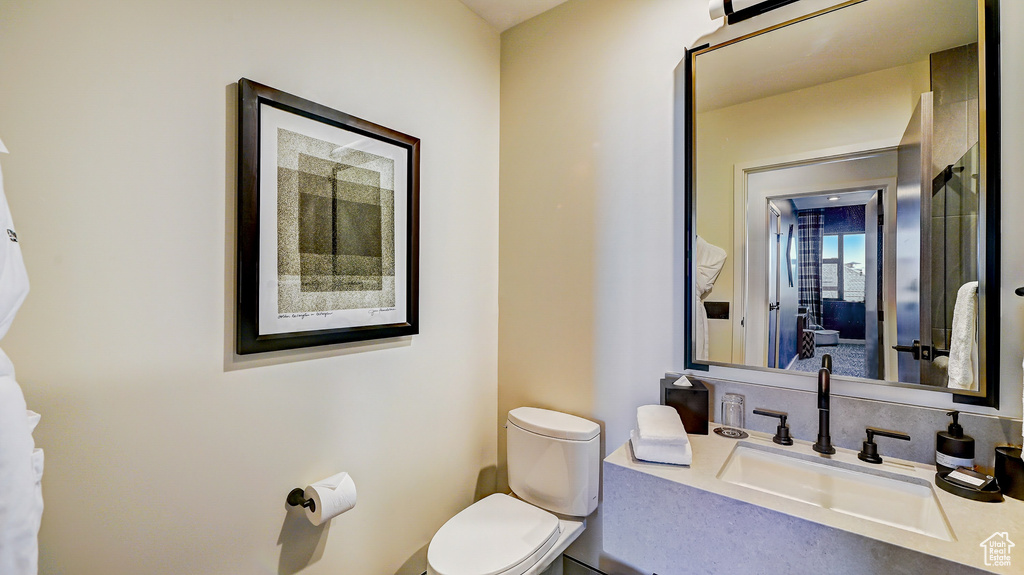 Bathroom featuring toilet and vanity