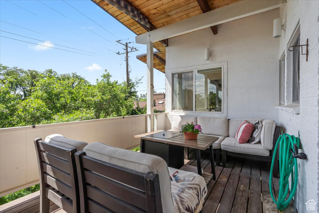 Wooden deck with outdoor lounge area