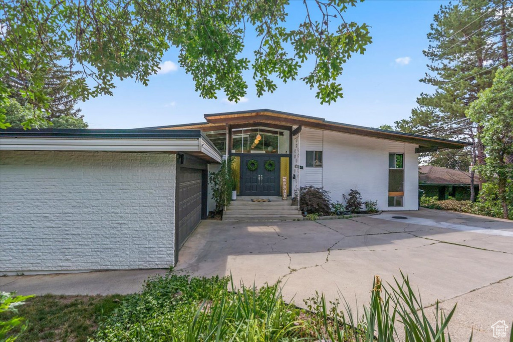 View of front of home featuring a garage