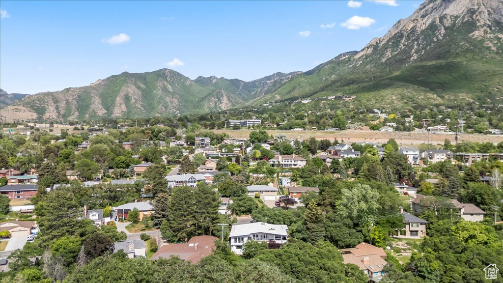 Aerial overview of property\\\\\\\'s location with a mountainous background