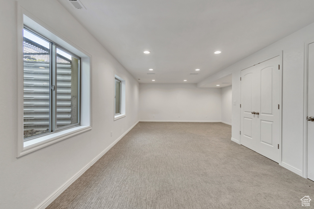 Below grade area featuring carpet and recessed lighting