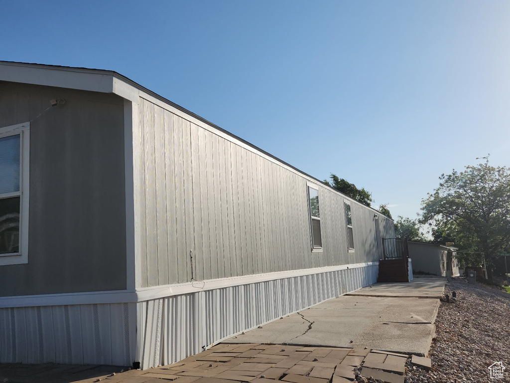 View of home's exterior with a patio area
