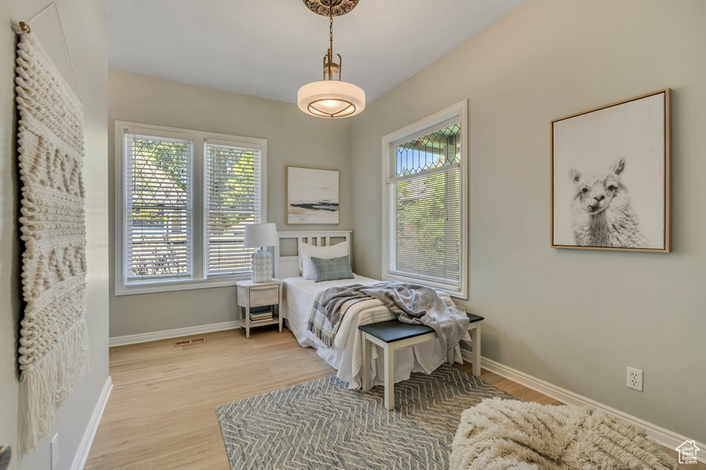 Bedroom featuring wood finished floors
