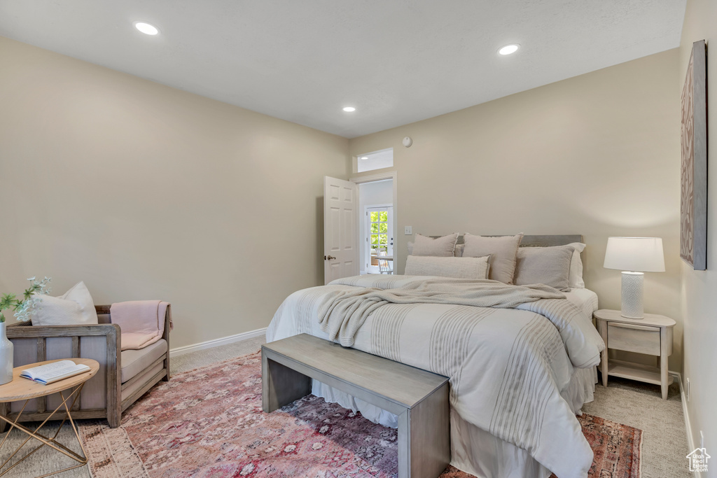 Bedroom featuring light colored carpet and recessed lighting
