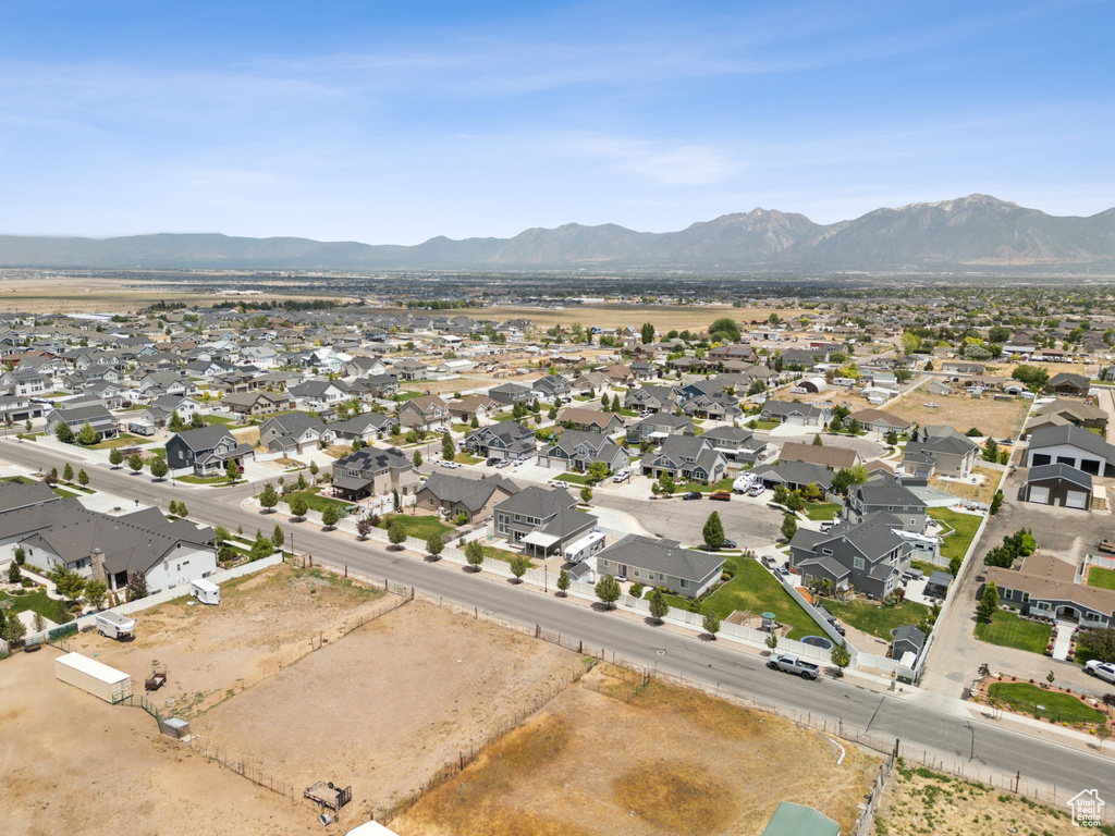 View of property location with nearby suburban area and mountains