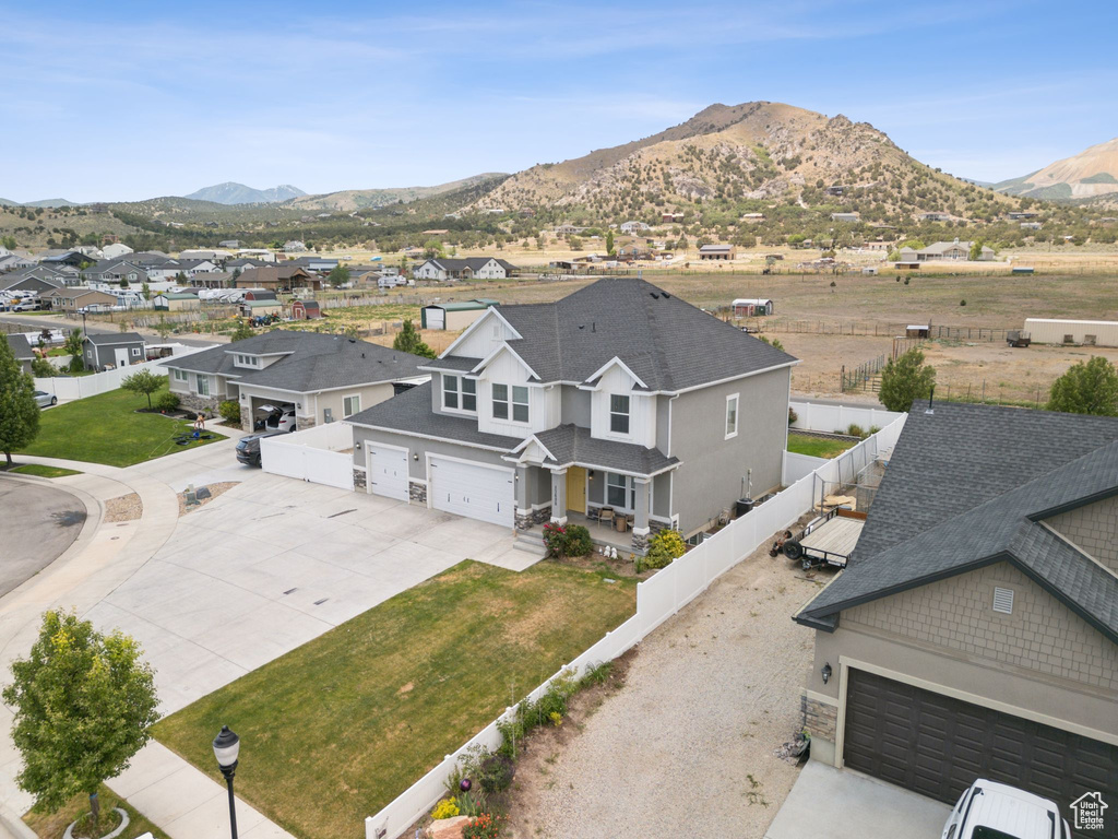 Aerial view of residential area with mountains