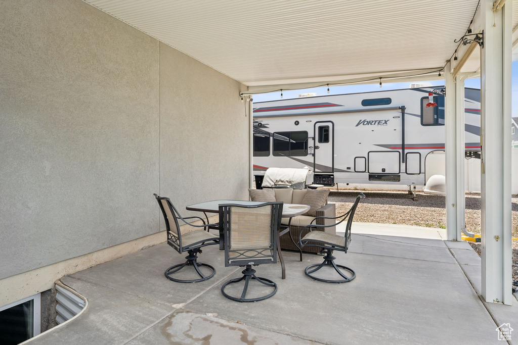View of patio with outdoor dining space