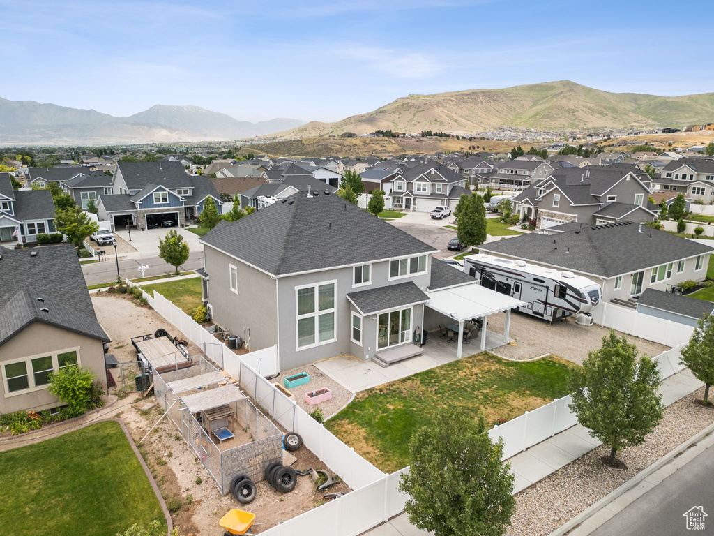 Aerial perspective of suburban area with mountains