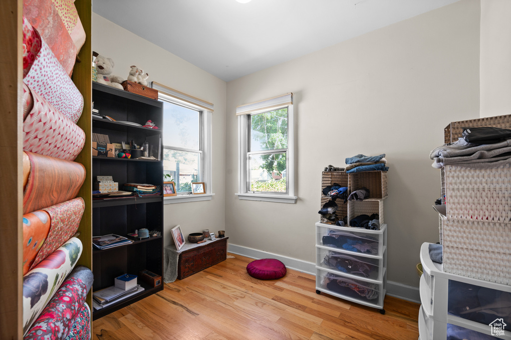 Interior space featuring wood finished floors and baseboards
