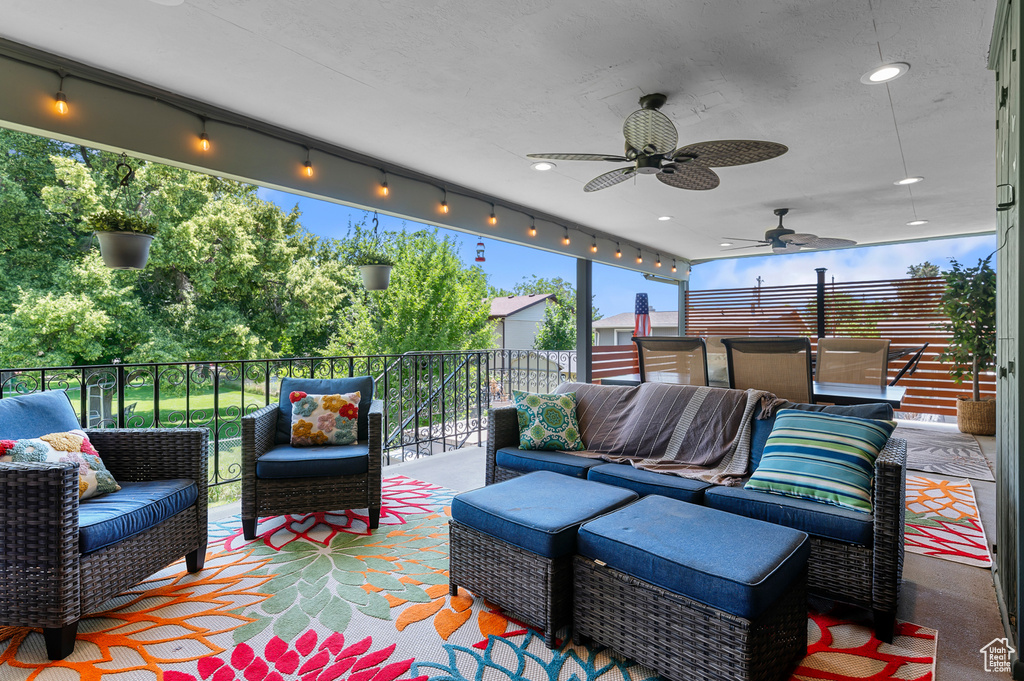 View of patio / terrace with an outdoor hangout area and a ceiling fan