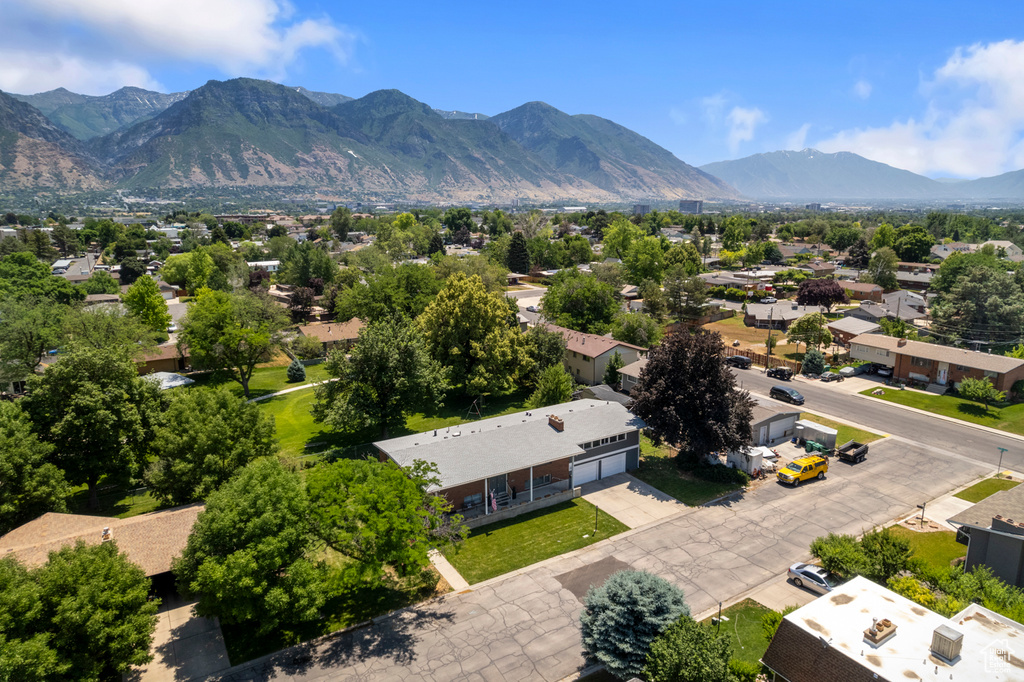 Aerial view of residential area with a mountain backdrop