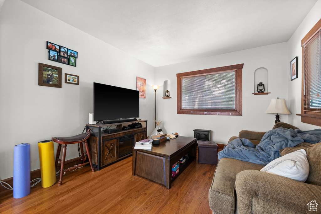 Living room with light wood-style flooring