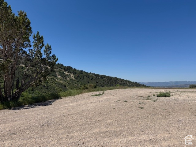 View of yard featuring a mountain view