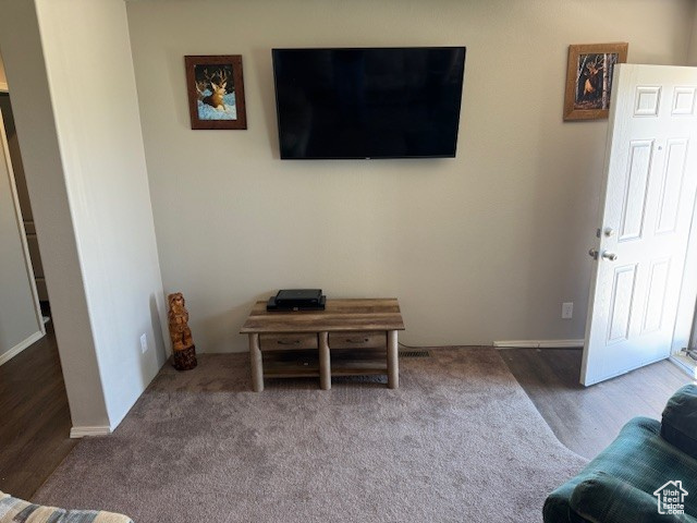 Living room with wood finished floors