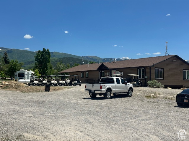 View of front of property featuring a mountain view