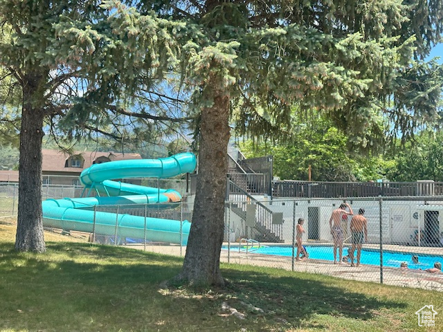 Community pool with a water slide