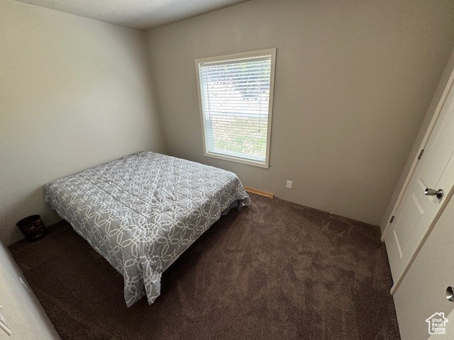 Bedroom with carpet