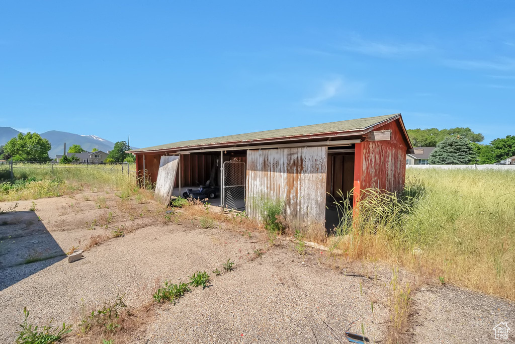 Stable featuring a mountain view