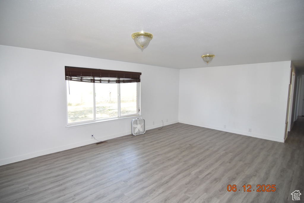 Empty room with wood finished floors