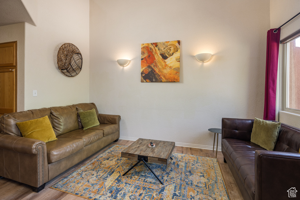 Living room featuring wood finished floors and baseboards