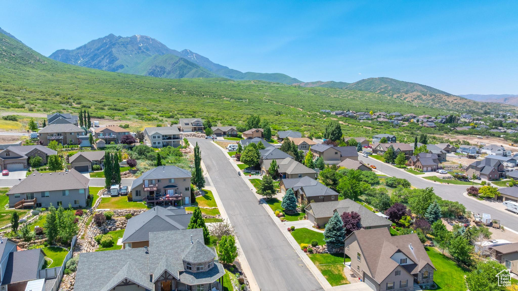 Aerial view of residential area with a mountainous background