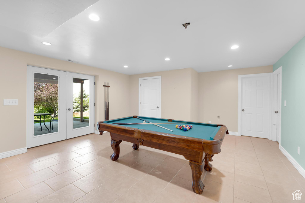Game room featuring pool table, light tile patterned floors, french doors, and recessed lighting