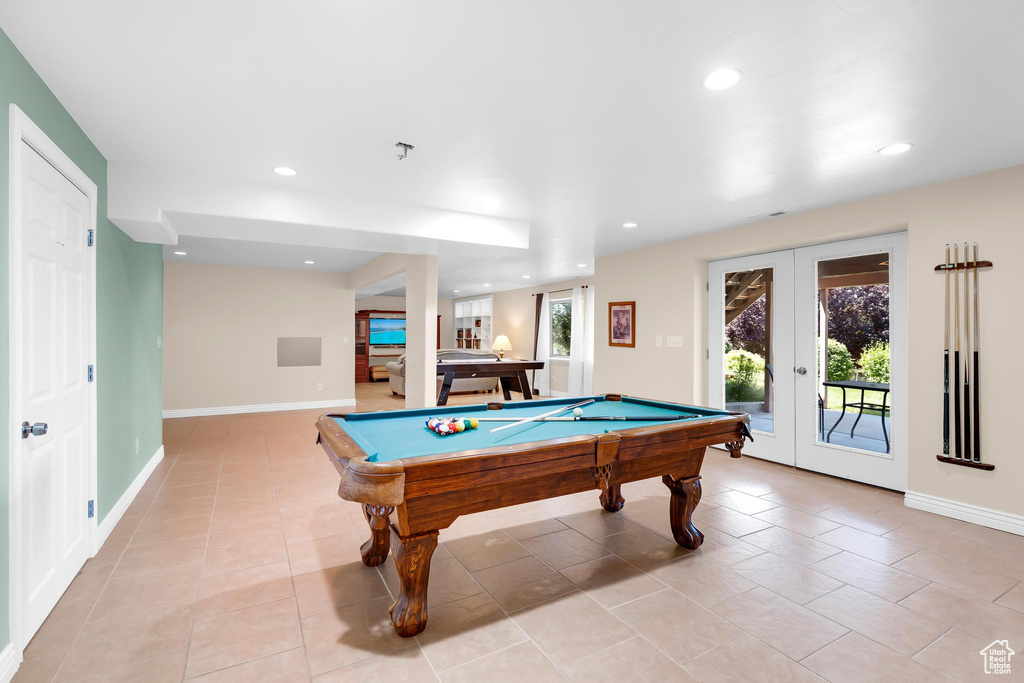Game room with french doors, light tile patterned floors, pool table, and recessed lighting